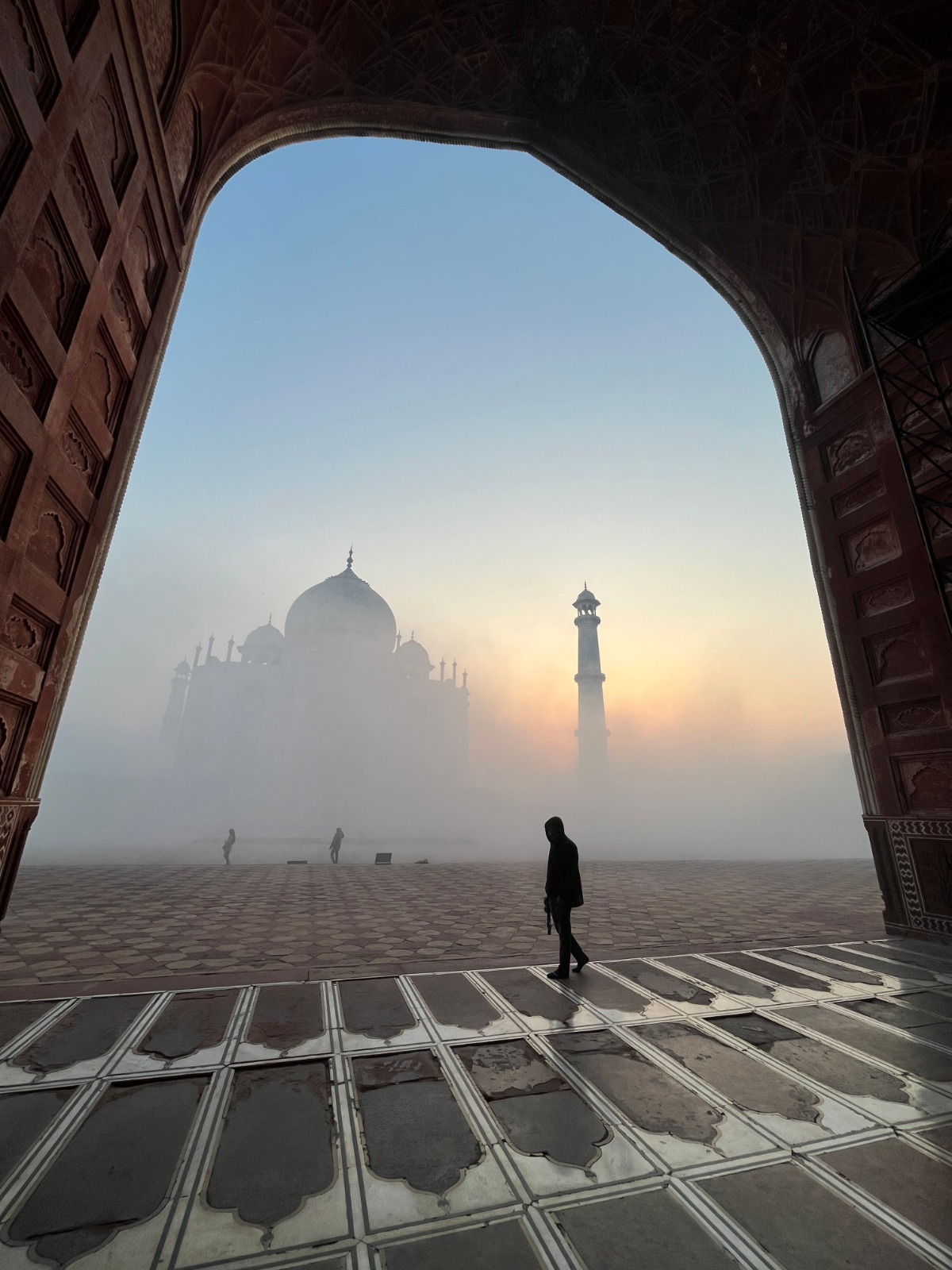 The Taj Mahal emerging from early morning mist